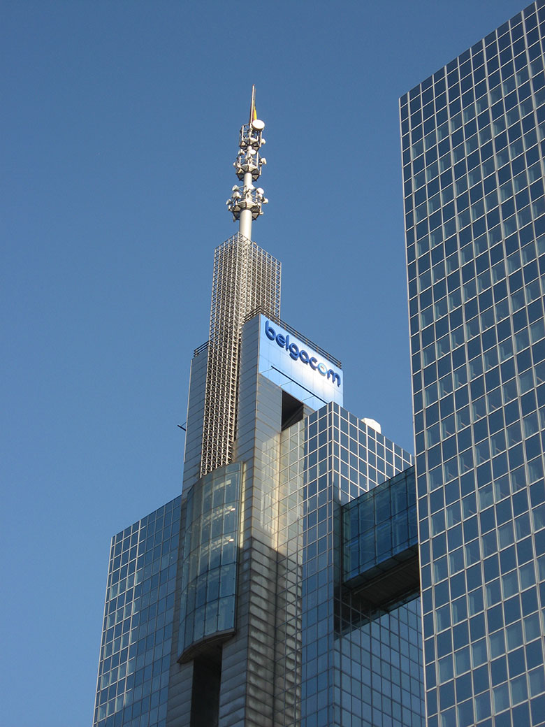 The peak of the Belgacom towers with its company logo and antenna